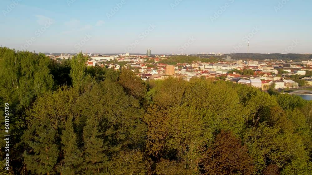 Revealing drone shot of Gediminas tower in Vilnius and old town Revealing drone shot of Gediminas tower in Vilnius and old town