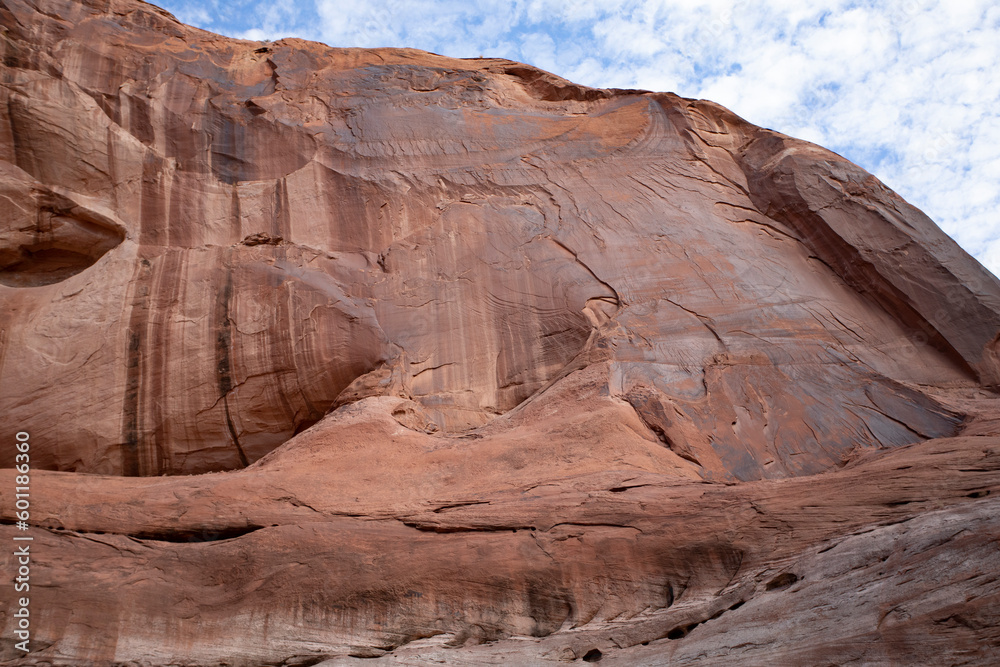 red rock texture with cracks, skies, water, background with space for design 