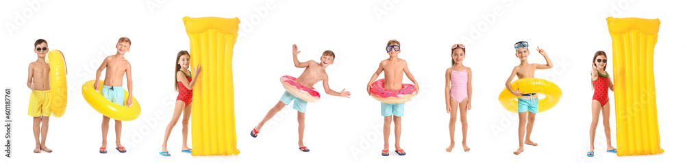 Fototapeta premium Set of cute children with inflatable mattresses and rings on white background