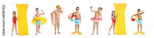 Set of cute children in beachwear on white background photo