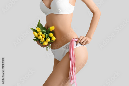 Young woman in underwear wi...