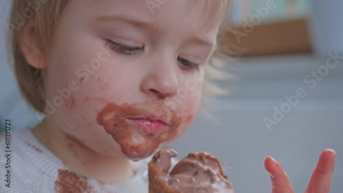 Cute Adorable Funny Happy Preschooler Girl Eating Chocolate Ice Cream Getting Her Face Dirty  
