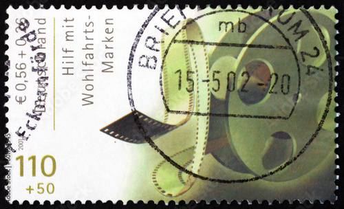 Obraz na płótnie Postage stamp Germany 2001 film reel, film industry w salonie
