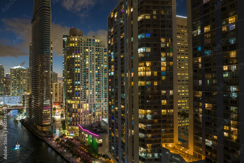 Obraz premium Aerial view of downtown district of of Miami Brickell in Florida, USA. Brightly illuminated high skyscraper buildings in modern american midtown