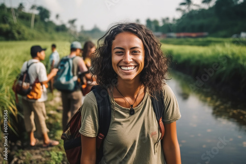 young adult woman traveling...