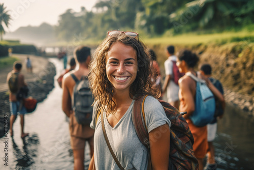 young adult woman traveling...