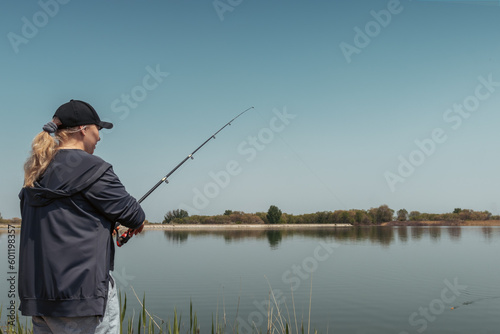 Woman with a fishing rod