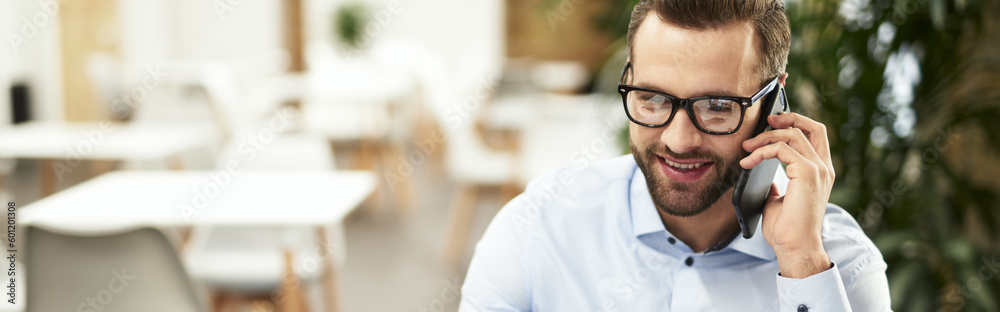 Confident office assistant answering the phone call Confident office assistant answering the phone call