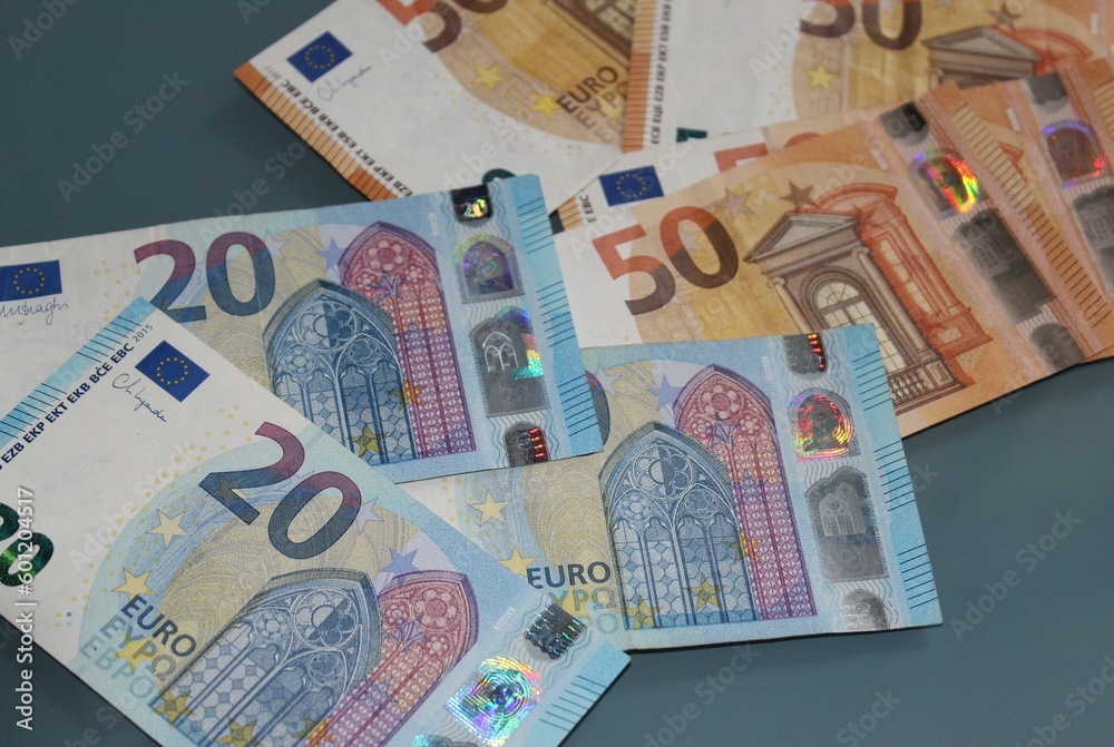 Many euro banknotes on the table Many euro banknotes on the table
