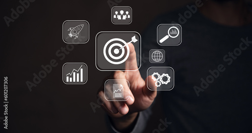 Targeting the business concept, target with digital marketing icons on virtual screen internet network connection, Business goal