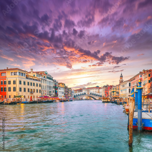 Amazing sunset and evening cityscape of Venice with famous Canal Grande and Rialto Bridge © pilat666