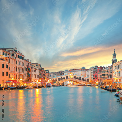 Stunning sunset and evening cityscape of Venice with famous Canal Grande and Rialto Bridge © pilat666