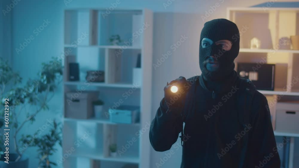A Two Robber Broke Into an Apartment or House. A Criminals in the Night with a Flashlight Looking for Jewelry and Money in the Apartment. High-Definition Cameras. Hidden Surveillance Cameras A Two Robber Broke Into an Apartment or House. A Criminals in the Night with a Flashlight Looking for Jewelry and Money in the Apartment. High-Definition Cameras. Hidden Surveillance Cameras