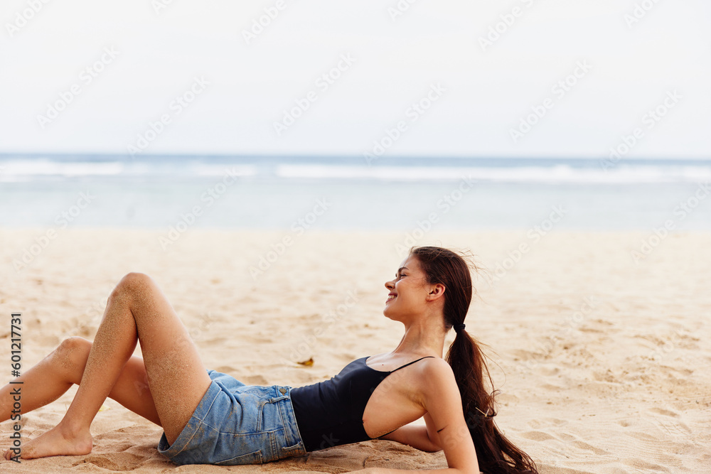 woman travel smile vacation sea sand ocean nature freedom beach sitting woman travel smile vacation sea sand ocean nature freedom beach sitting