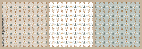 Set of Abstract Ethnic Seamless Patterns. Triangles and Double Check marks. Boho Herringbone pattern. Tribal Geometric Background. Earth color Wallpaper