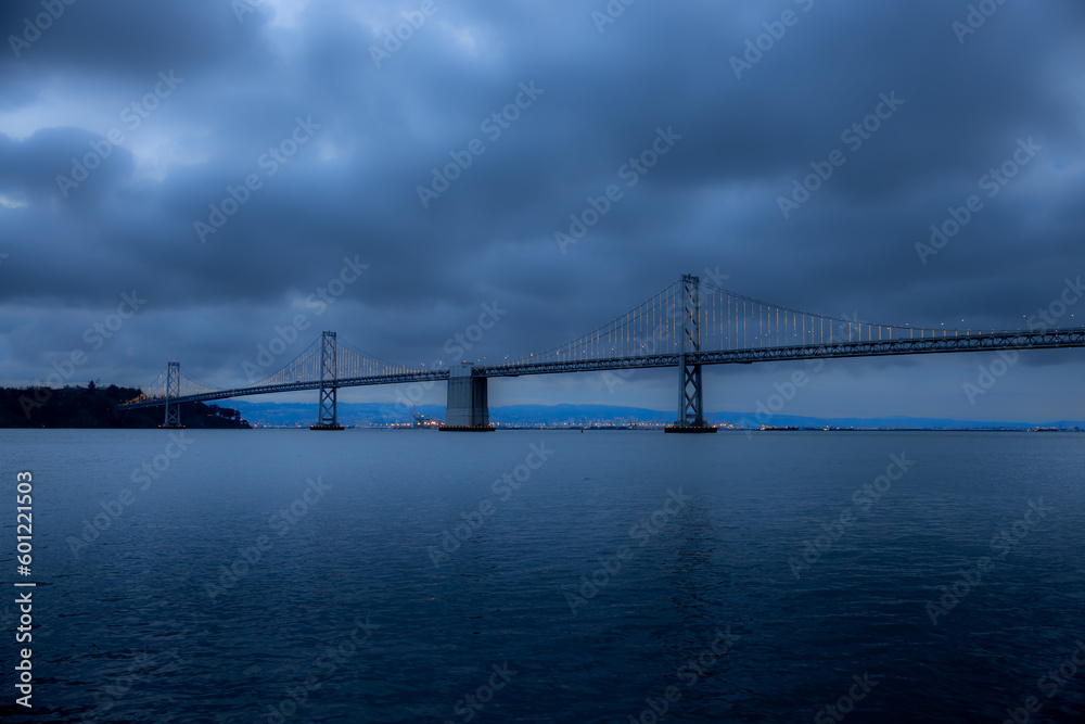 Obraz premium Photo of the Bay Bridge in San Francisco, CA Taken around 7am before a big storm.