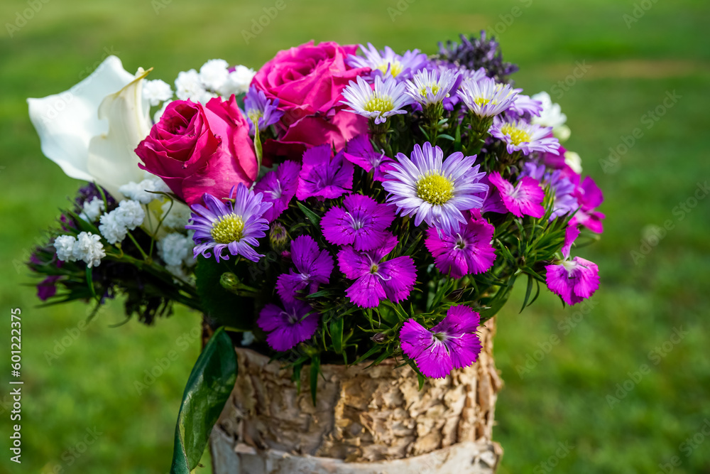 Close up of a beautiful bouquet of pink and purple flowers.