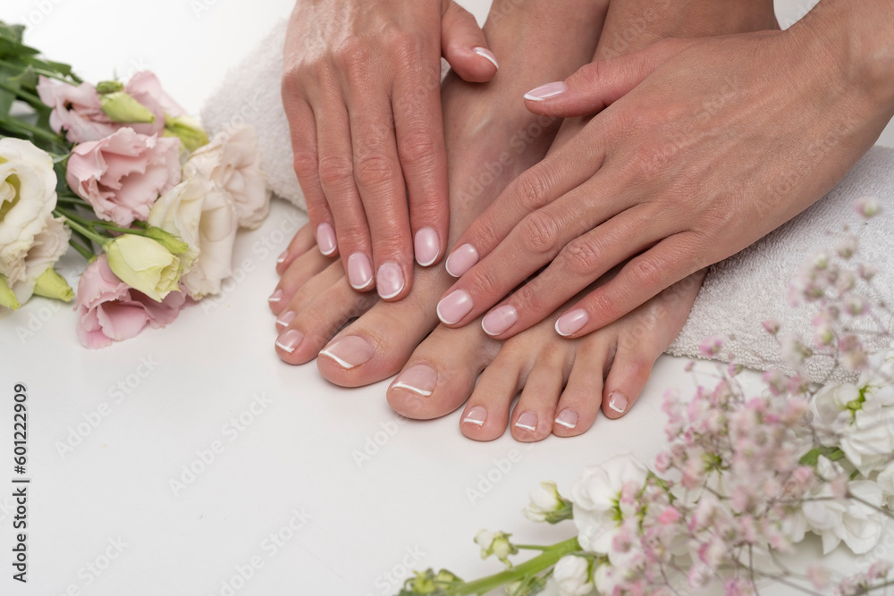 Perfect female feet with flowers.