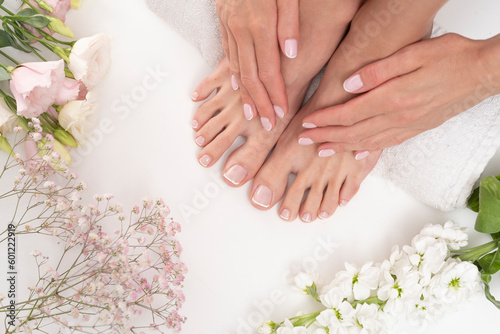 Stampa su tela Perfect female feet with flowers.