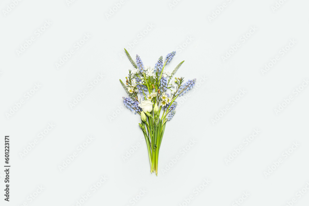 Obraz premium Beautiful bouquet with different flowers on grey background