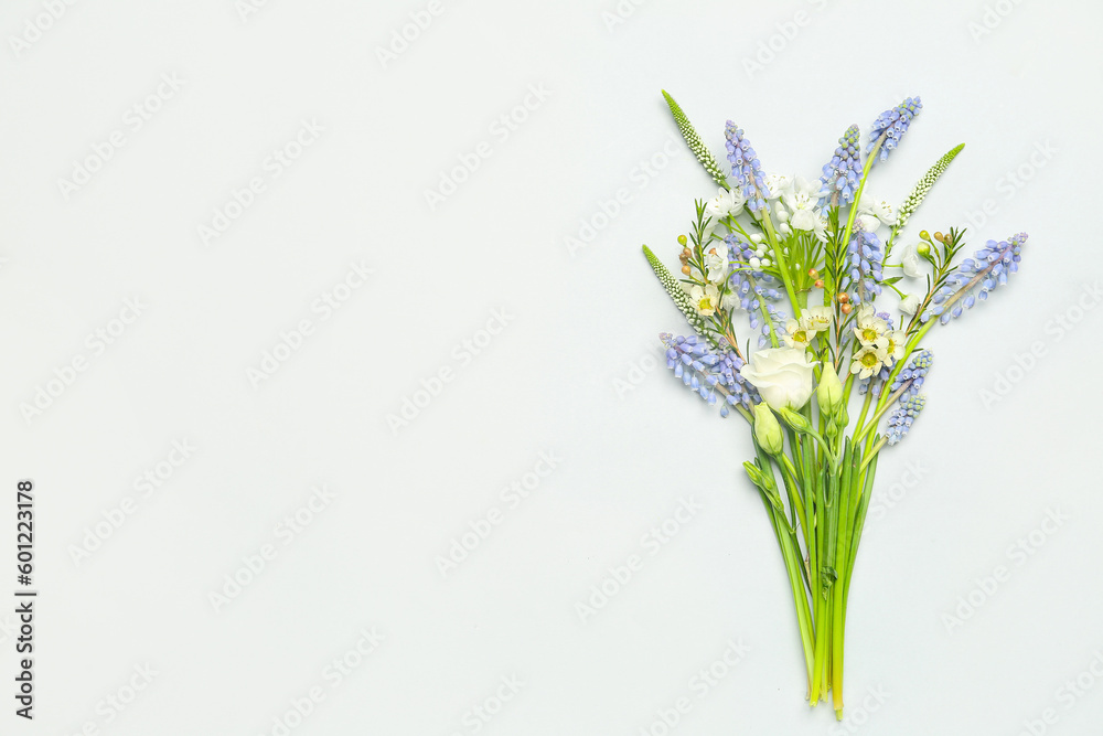 Beautiful bouquet with different flowers on grey background Beautiful bouquet with different flowers on grey background