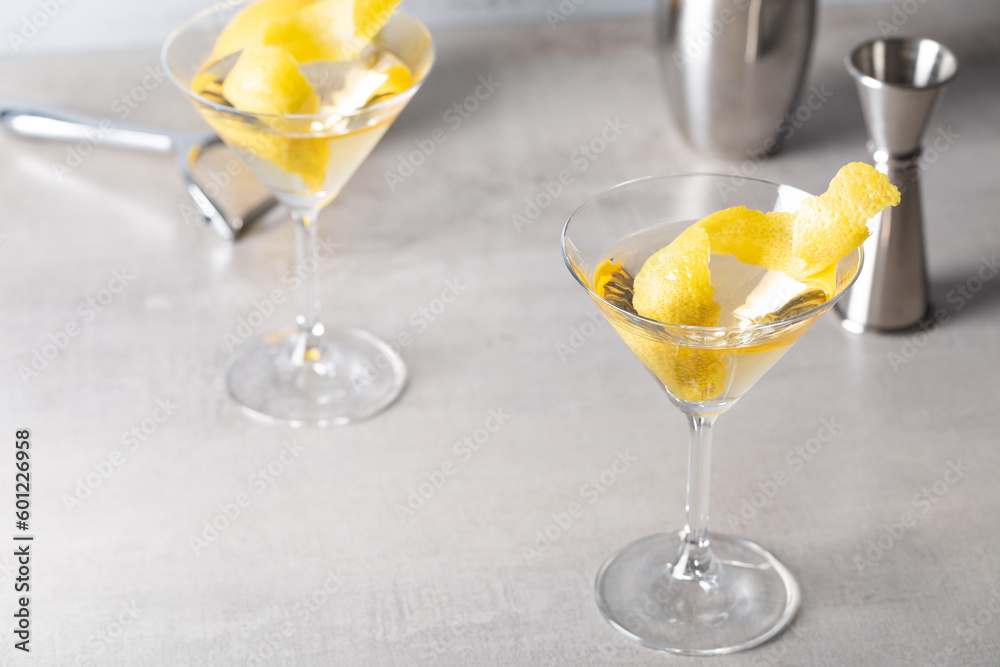 Martini Cocktail boozy gin, Italian vermouth, orange bitters and a twist of lemon peel