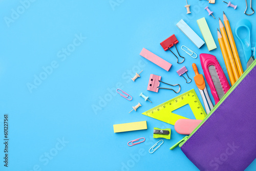 Back to school. Many different school stationery on light blue background, flat lay. Space for text