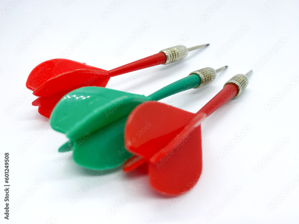 red and green darts with isolated white. darts hand. darts can be thrown red and green darts with isolated white. darts hand. darts can be thrown