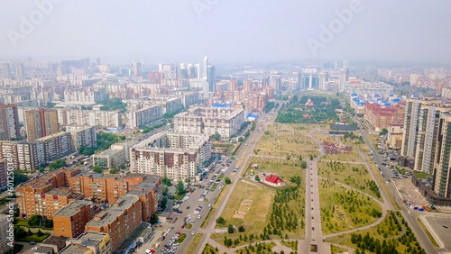 Russia, Krasnoyarsk - July 23, 2018: Park named after the 400th anniversary of the city of Krasnoyarsk. City panorama, From Dron