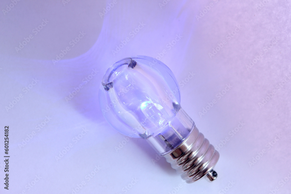 mini light bulb isolated on white background. purple color lighting mini light bulb isolated on white background. purple color lighting