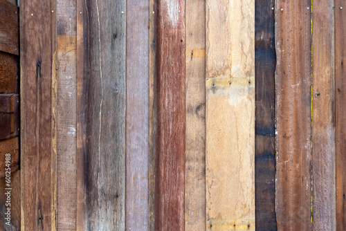 Old brown vintage wooden planks wall vintage texture abstract for background for design and decoration. Wood material backdrop for Vintage wallpaper. Reclaimed wood background.