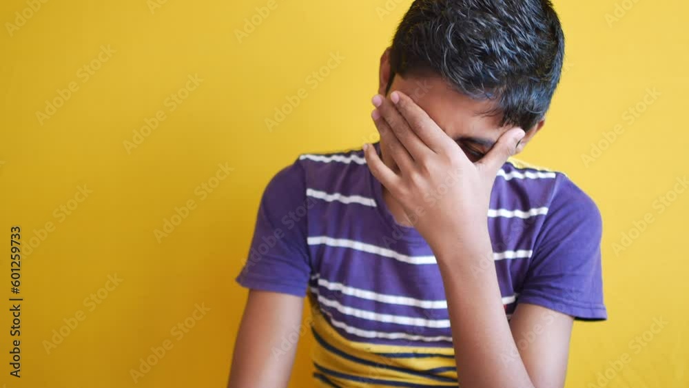 Young man suffering headache, close up 