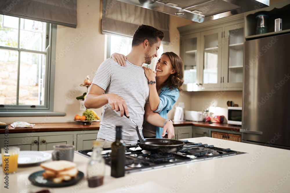 Love, food and cooking with couple in kitchen and hugging for breakfast, morning and happiness. Smile, care and nutrition with man and woman eating at home for happy, health and hungry together - obrazy, fototapety, plakaty 
