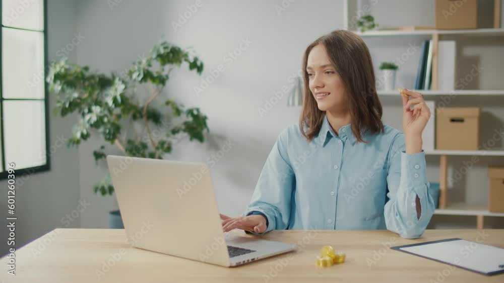 Woman Freelancer Holds Gold BTC Coins at Home, Successful Developer Programmer. Woman Stock Trader Earning Bitcoins After Online Monitoring Trading Operations. Increasing Wealth, Financial Prosperity. Woman Freelancer Holds Gold BTC Coins at Home, Successful Developer Programmer. Woman Stock Trader Earning Bitcoins After Online Monitoring Trading Operations. Increasing Wealth, Financial Prosperity.
