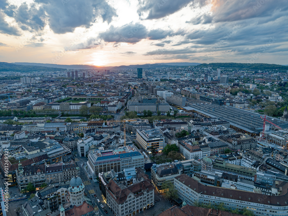 Aerial view over Swiss City of Zürich with skyline and Limmat Valley in the background on a beautiful spring evening with colorful dramatic sky. Photo taken May 6th, 2023, Zurich, Switzerland.