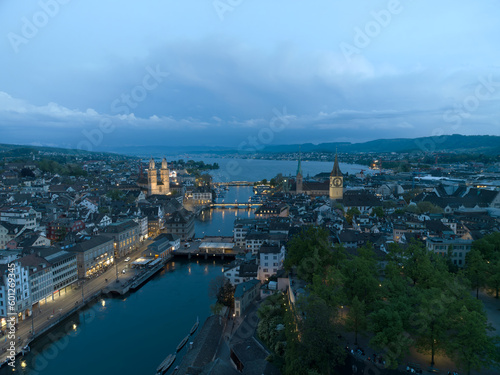 Aerial view over Swiss City of Zürich with Limmat River, old town and Lake Zurich on a beautiful spring evening with colorful dramatic sky. Photo taken May 6th, 2023, Zurich, Switzerland.