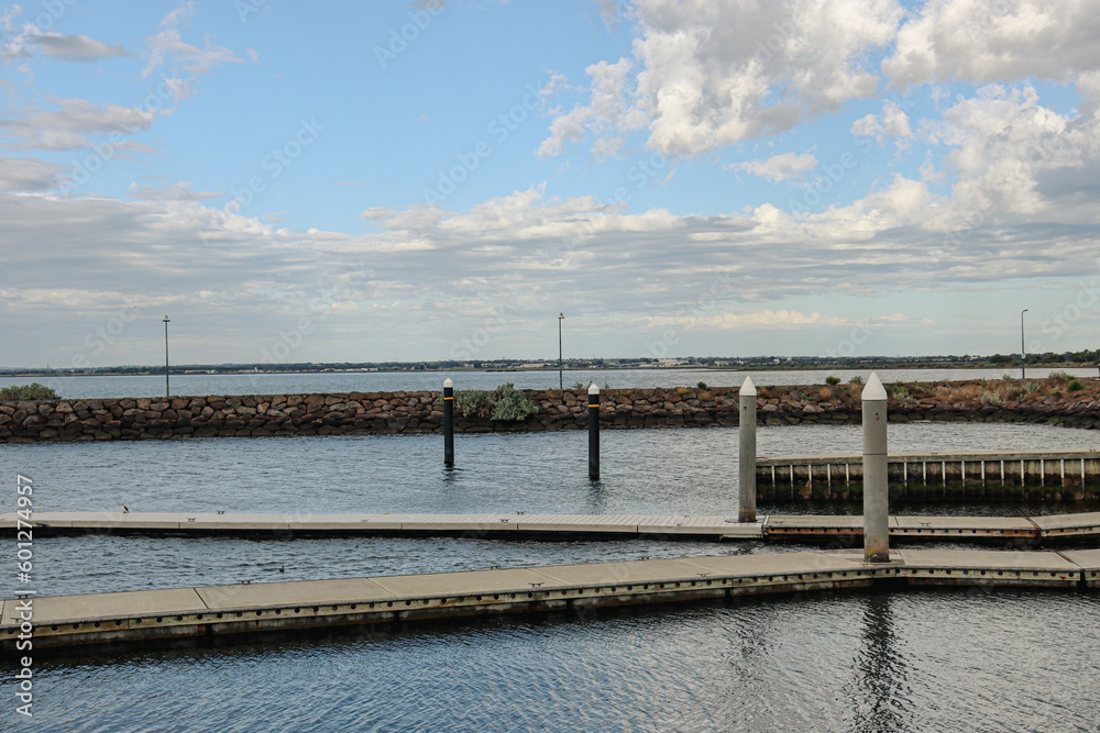 coastal landscape with boat ramp and pier