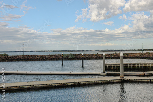 coastal landscape with boat ramp and pier