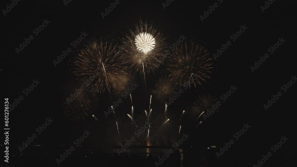 Real Fireworks on night backgrounds. abstract real shining fireworks with bokeh lights in the night sky. Celebration fireworks festival and New year's eve. Colorful fireworks. Footage b roll scenes. Real Fireworks on night backgrounds. abstract real shining fireworks with bokeh lights in the night sky. Celebration fireworks festival and New year's eve. Colorful fireworks. Footage b roll scenes.