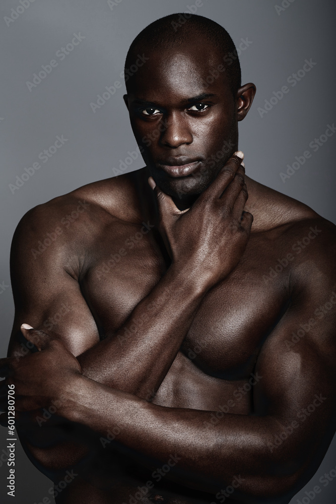 Muscle, body and skin, portrait of black man on dark background with and serious face for art aesthetic. Health, wellness and sexy, fit African bodybuilder or male model isolated on studio backdrop Muscle, body and skin, portrait of black man on dark background with and serious face for art aesthetic. Health, wellness and sexy, fit African bodybuilder or male model isolated on studio backdrop