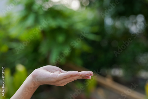 Technology, hand holding with environment Icons over the Network connection on green background.