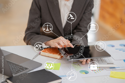 Lawyers Asiawoman   having through online Concepts  of Legal services at the law office. photo