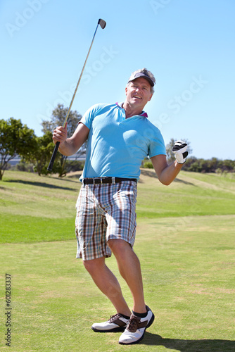 Happy golfer man, fist celebration and game on grass with winning, goal or outdoor for sports, exercise or contest. Senior guy, winner and excited at golf course with sunshine, competition or workout