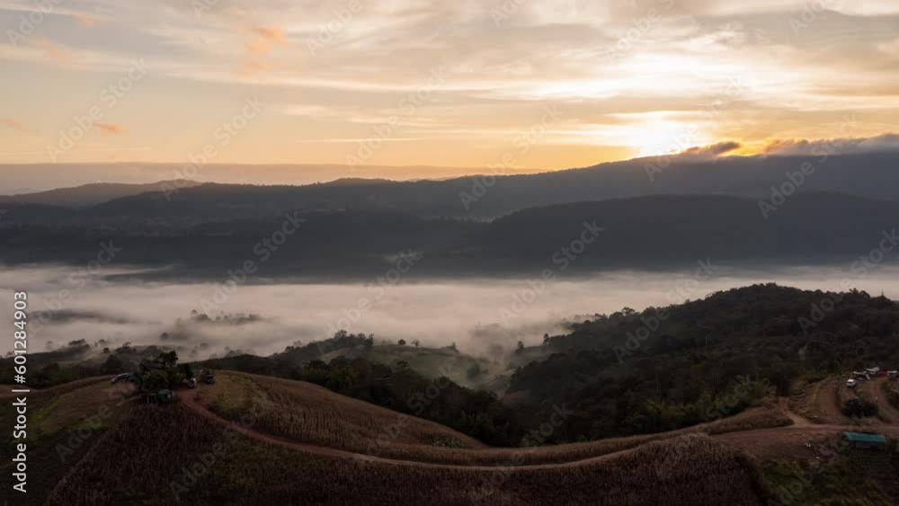 Hyper lapse timelapse a Sea of fog. Aerial view hyperlapse timelapse of mountain peak over misty cloud at sunrise. Footage b roll 4k. Hyper lapse timelapse a Sea of fog. Aerial view hyperlapse timelapse of mountain peak over misty cloud at sunrise. Footage b roll 4k.