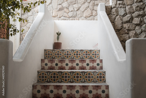 Staircase with unique Mexican floor tiles photo