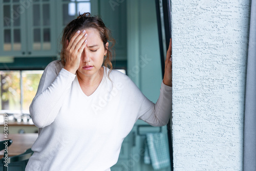 Young woman suffering from vertigo or dizziness problem of brain or inner ear