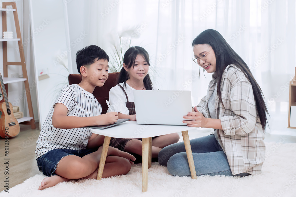 Asian boys and girls Learning various subjects with special teachers happily. Asian boys and girls Learning various subjects with special teachers happily.