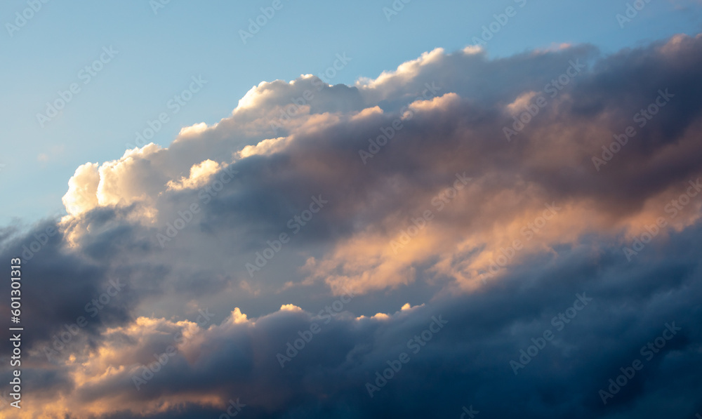 Rain clouds at sunset as background Rain clouds at sunset as background