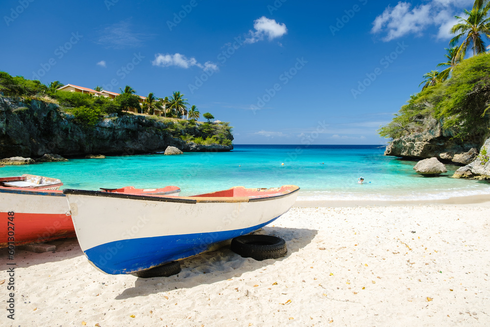 Wooden fishing boats at Playa Lagun Beach Curacao, Lagun Beach Curacao a small island in the Caribbean. 