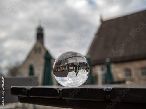 Obraz na plátně Crystal lens refractory ball in city